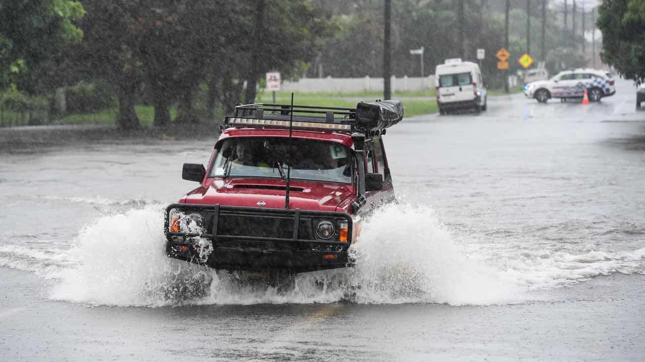 Croc sightings claimed as rain, flooding lash region