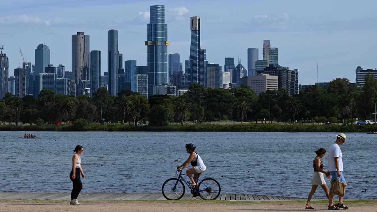 Fire-hit state struck by storms as heatwave continues