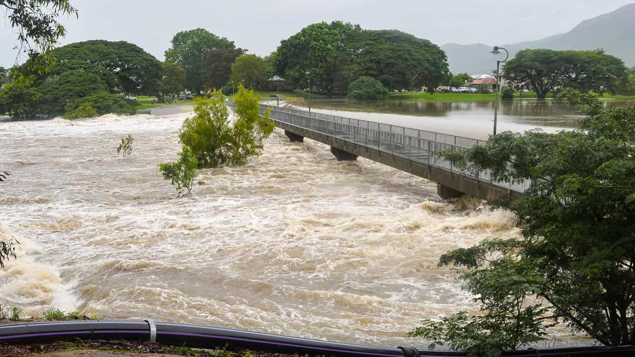 Flood record on brink of sinking as rain misery goes on