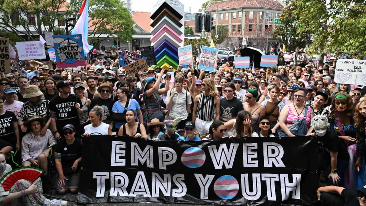 Trans rallies push back against curb on gender care