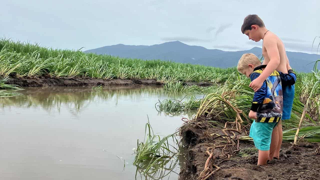 Residents count cost of flooding as cyclone nears coast