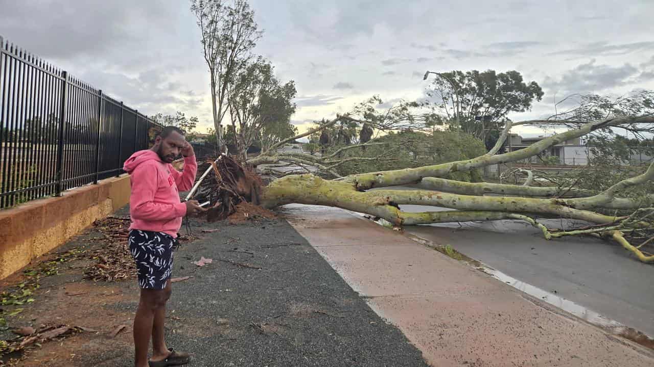 Towns face flood threat after escaping worst of cyclone