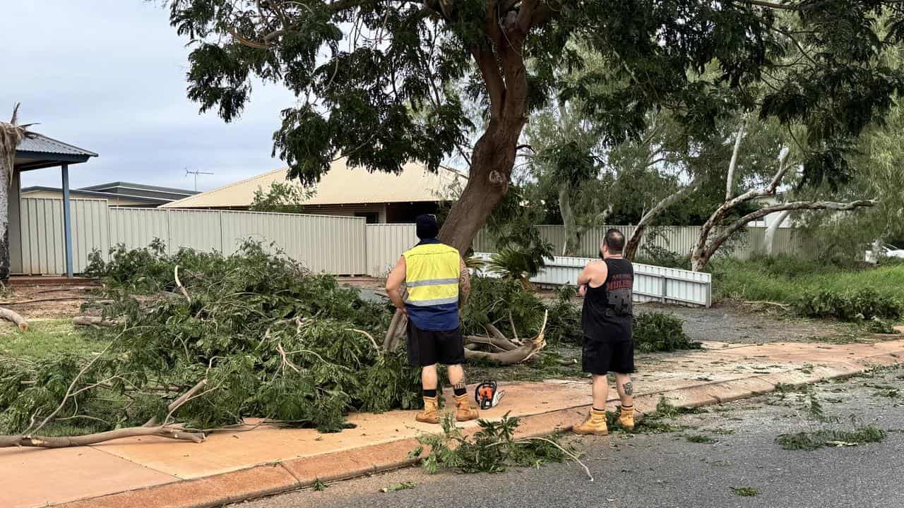 Residents pick up the pieces as wild weather weakens