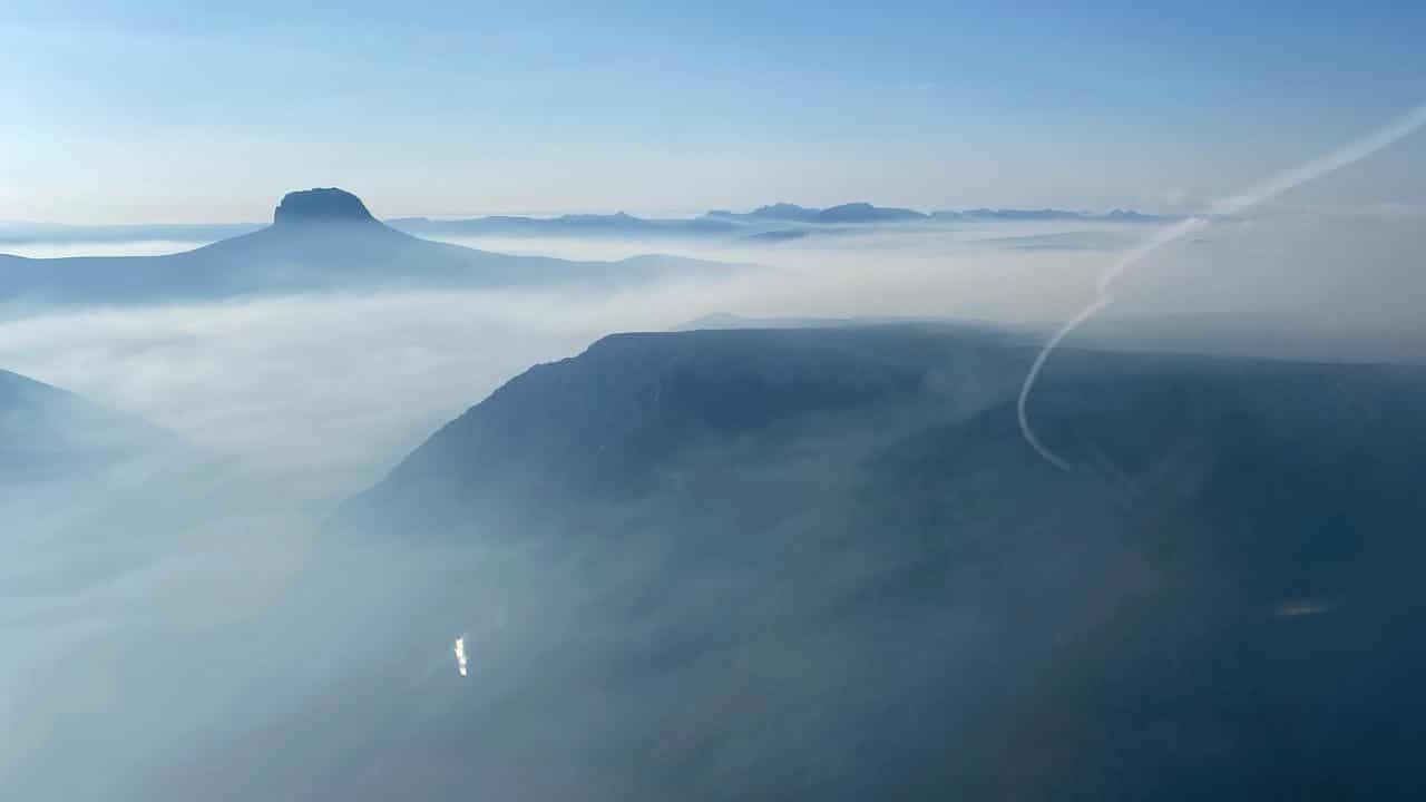 Cool change eases fire risk as popular track reopens