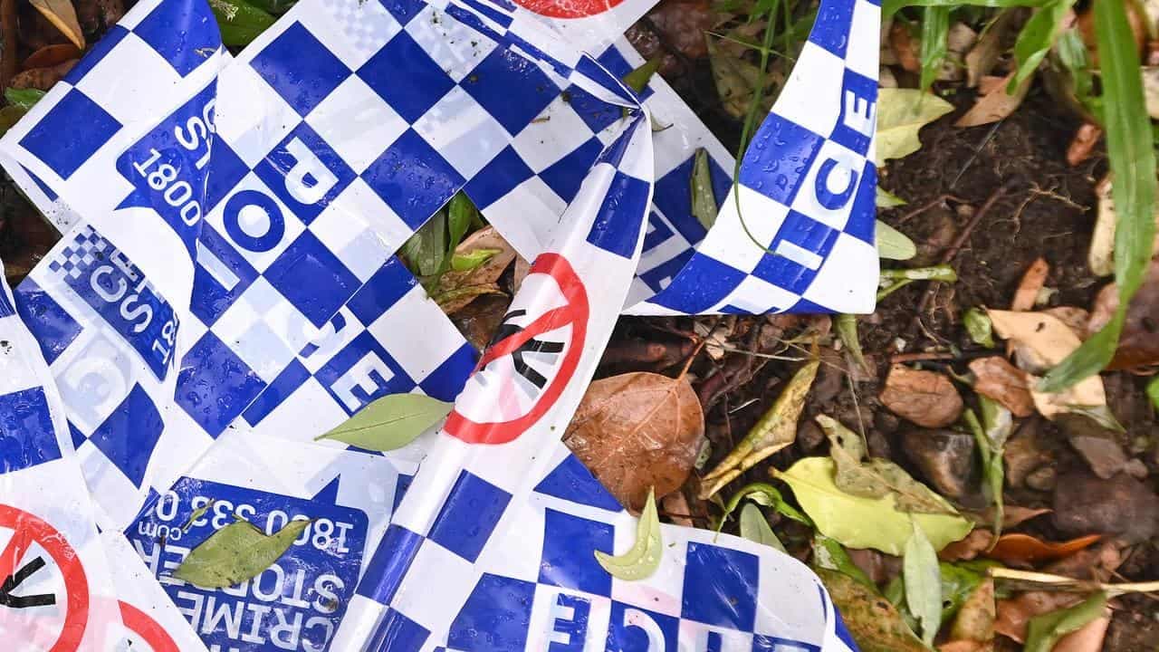 Man charged with murder after woman shot on street