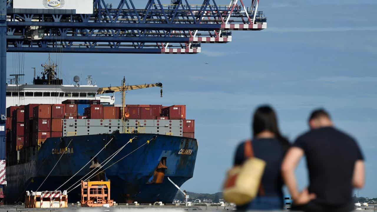 Australian shares slide again as trade war ramps up