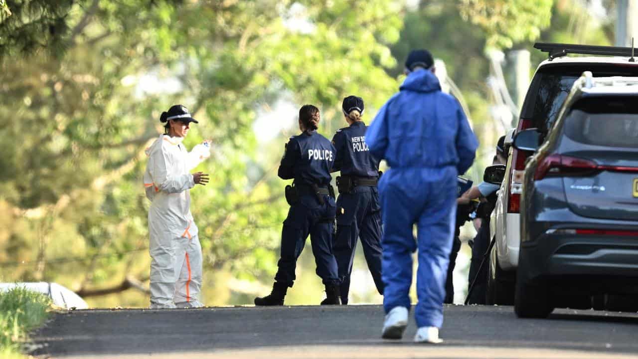 Murder charge after partially buried body uncovered