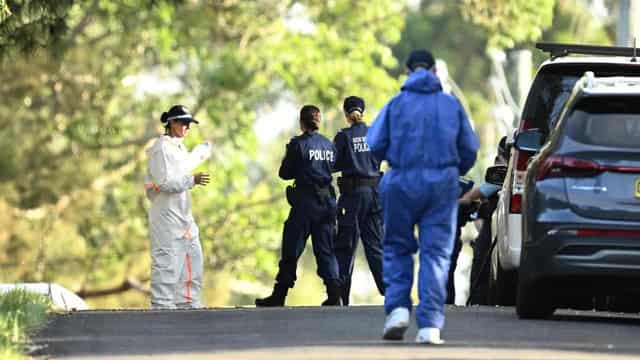 Murder charge after partially buried body uncovered