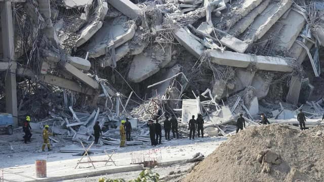 High-rise falls as powerful quake rocks Southeast Asia