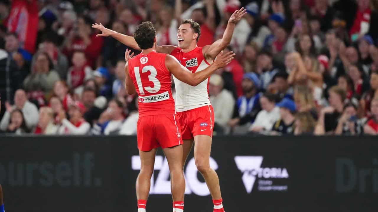 Swans flex muscles with convincing AFL win over North