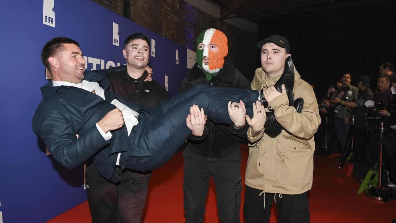 Rap trio Kneecap investigated over 'kill your MP' video