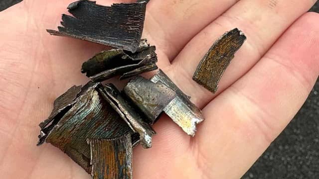 Strewn steel shards strand hundreds of cars on motorway