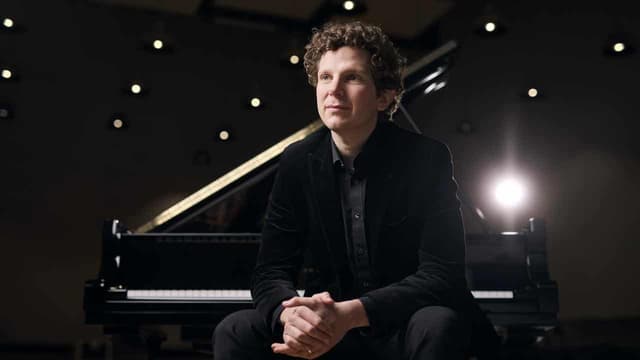 No early curtain on axed pianist's feud with symphony