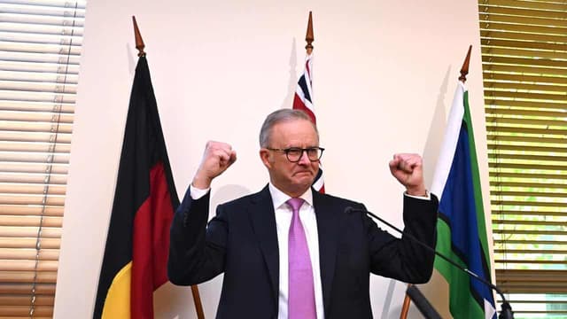 PM rallies troops, urges caucus to focus on Australians