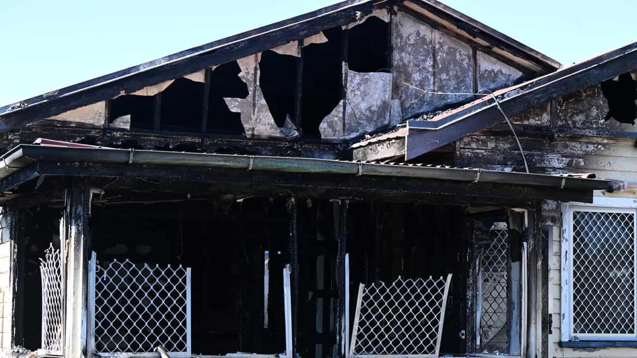 Woman charged with murder after kids die in house fire