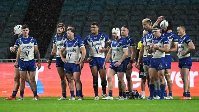 Dolphins rise in the wet to rip through depleted Dogs