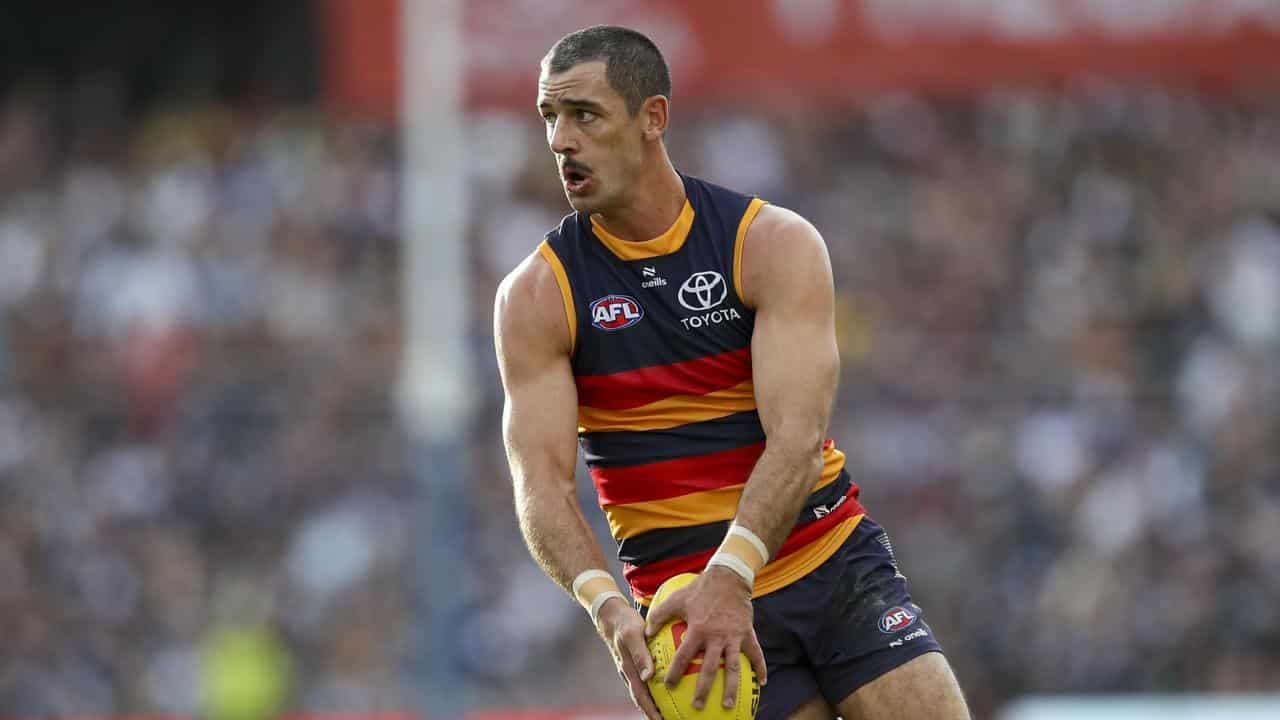 Crows star in tightrope race to reach 300 milestone