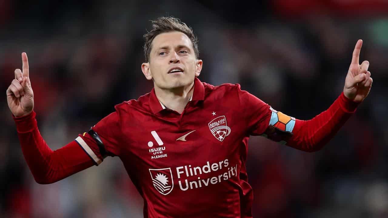 'Unfinished business': Socceroos star seals Reds return