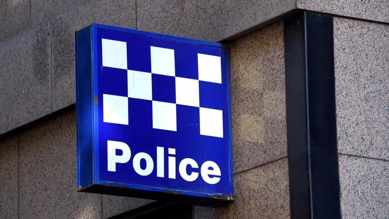 Man held after rifle shots spark search and shut school