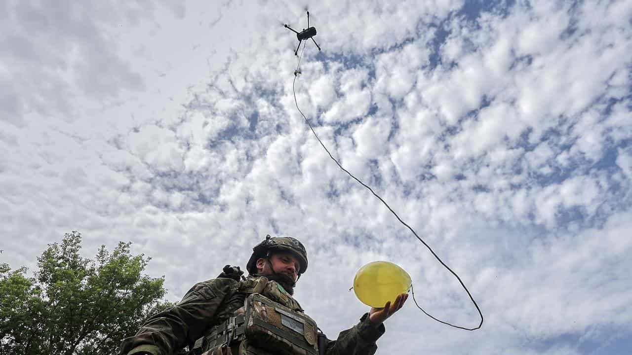 Two dead in Russian attacks on Ukraine, talks uncertain