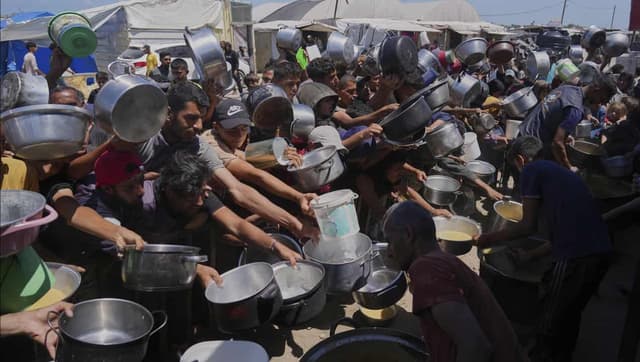 US-backed Gaza aid group to halt distribution of food