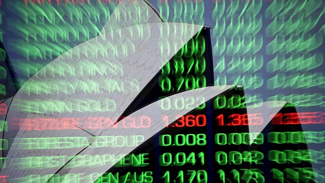 Australian shares fade after hitting new record