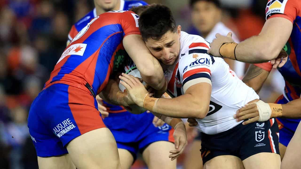 Roosters win as Radley suffers another head knock