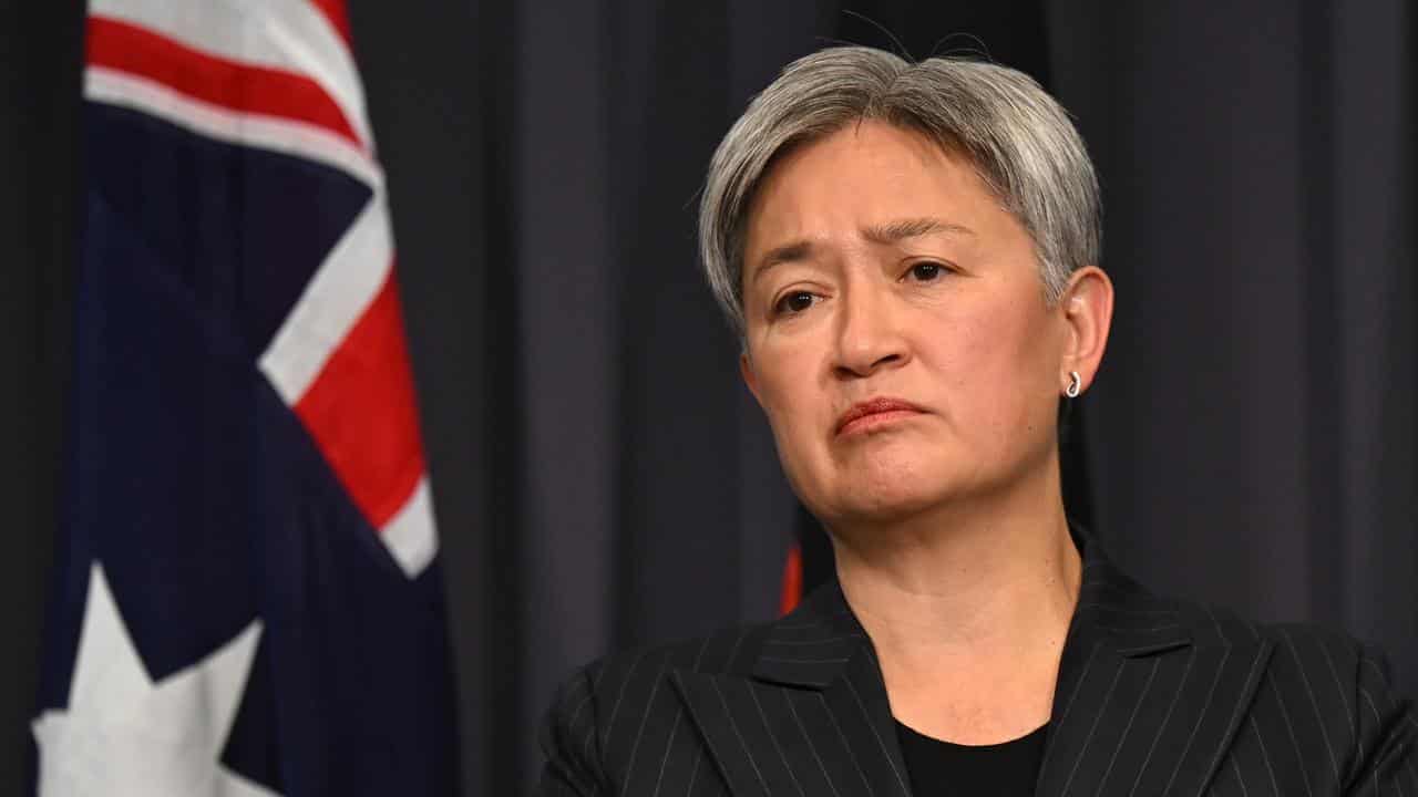 Australia's Iran embassy staff leave after US warning