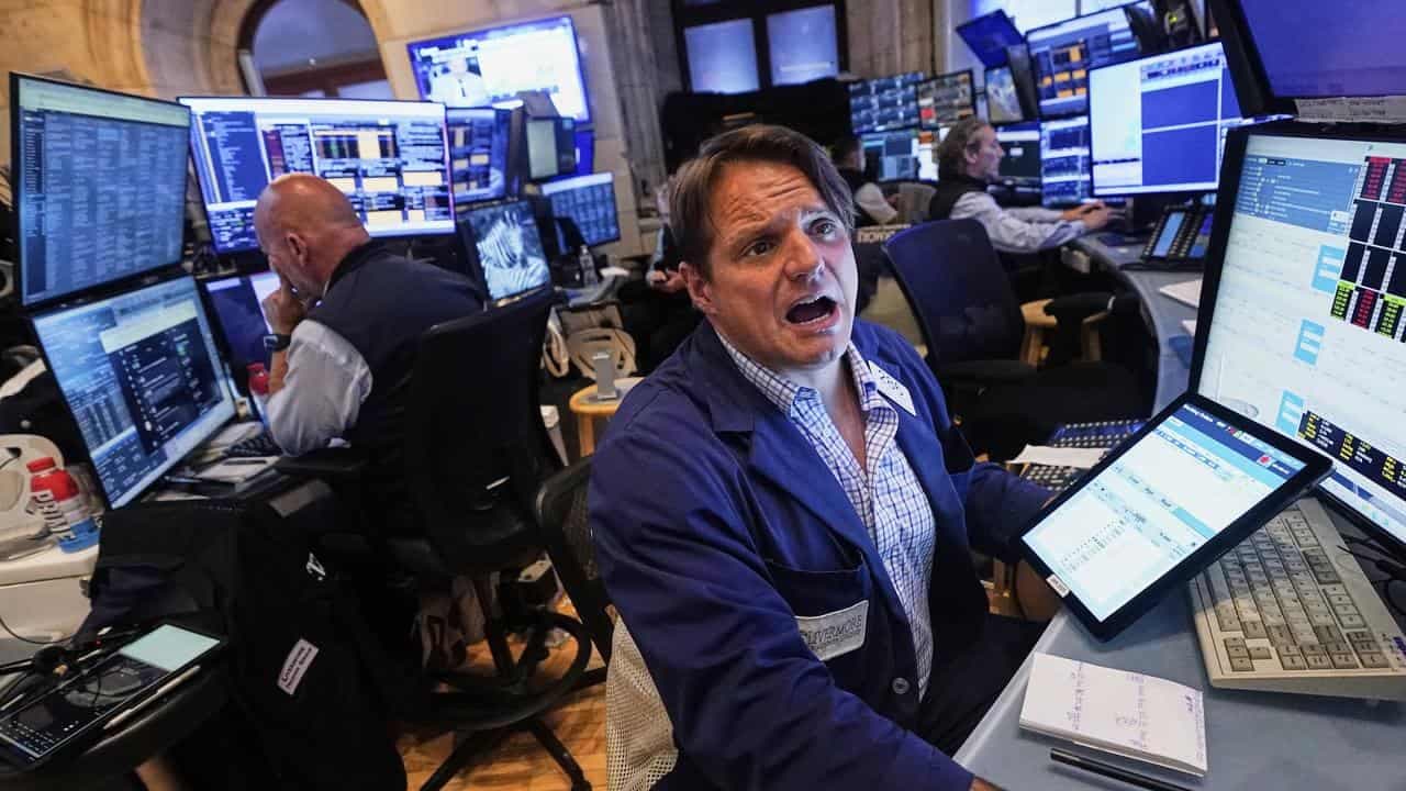 Wall St gains as rate cut hopes offset Iran war fears