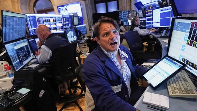 Wall St gains as rate cut hopes offset Iran war fears
