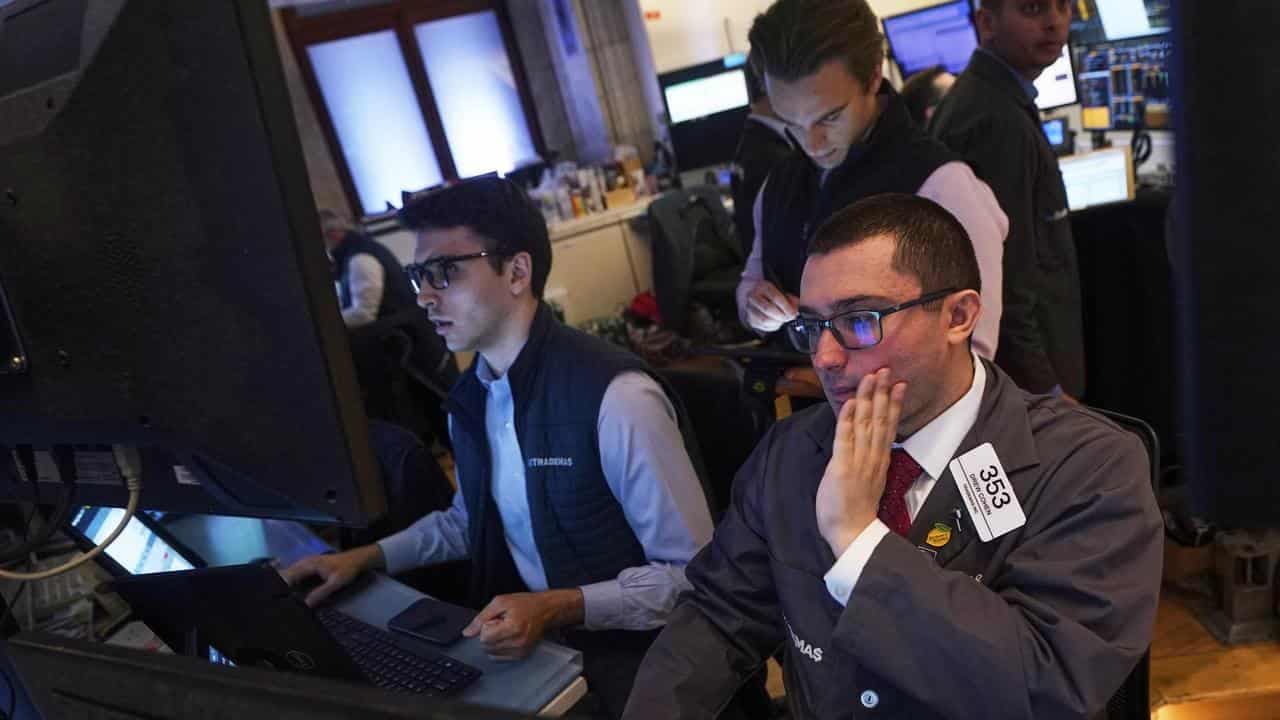 Wall St ends mixed amid cooling Israel-Iran tensions