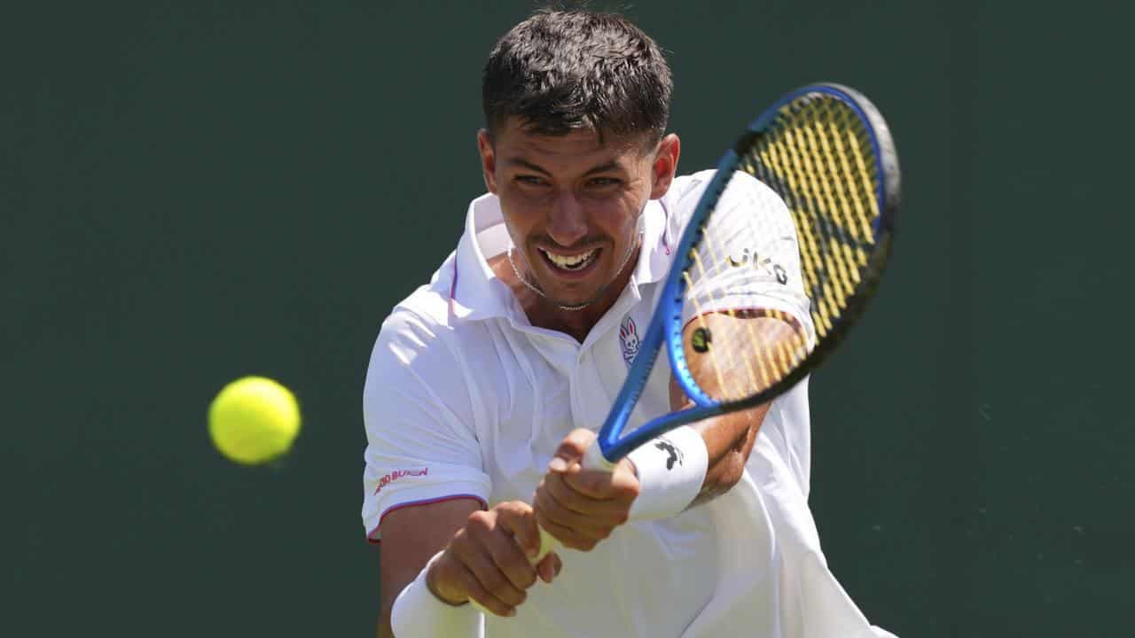 Popyrin humbled as ailing Tommo saves day at Wimbledon