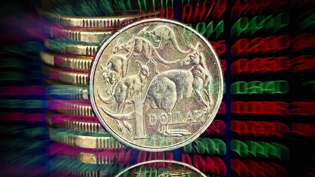Aussie dollar hits seven-month high as shares flatline