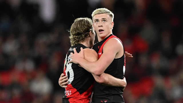 AFL clears Bombers star over huge umpire collision