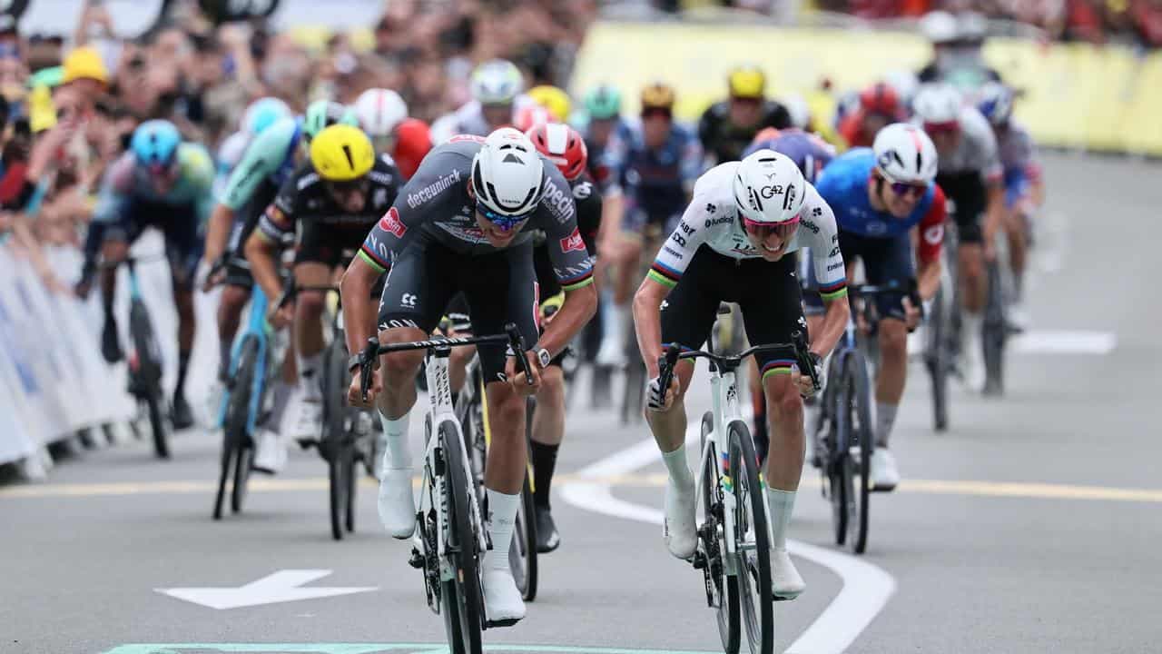 Van der Poel edges out Pogacar to claim yellow jersey