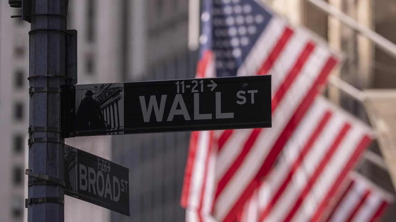 Wall St edges lower as investors await tariff clarity