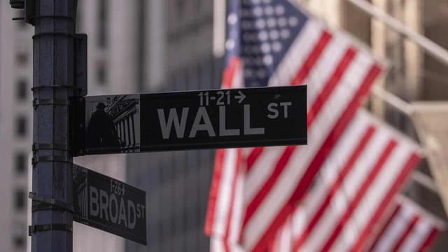 Wall St edges lower as investors await tariff clarity