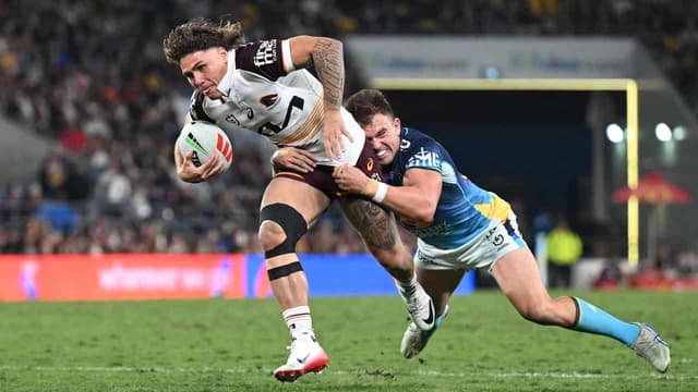 Walsh magic sinks Titans as Broncos win five in a row