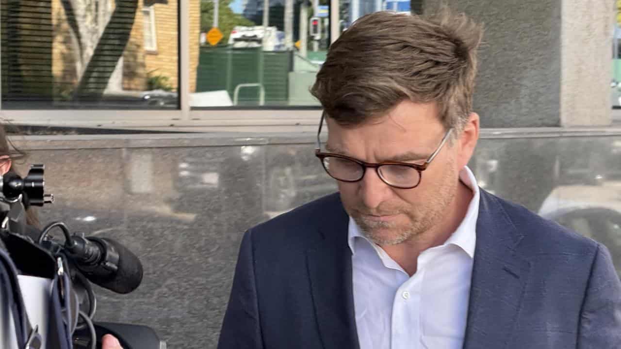 Bank exec charged with seeking girls for sex gets bail