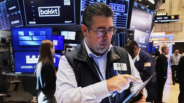 Wall Street slips as earnings results released