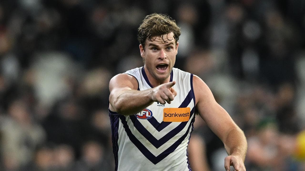 Dog and Dogga all smiles as Sean Darcy hits his straps