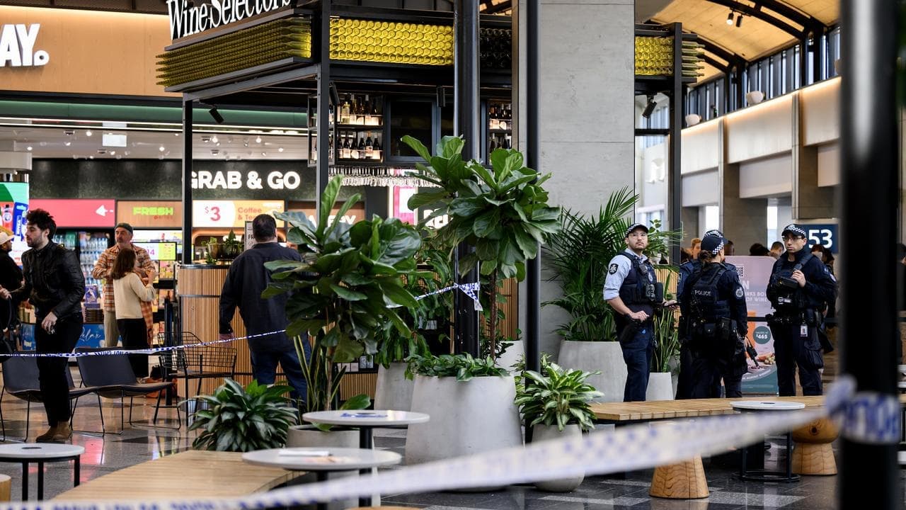 Cop gun 'unintentionally' shot in airport, man charged