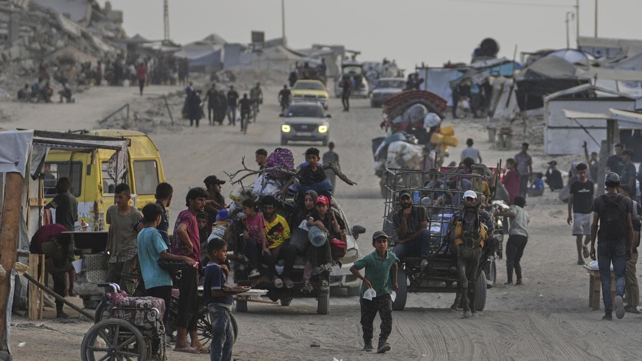 Hamas at talks, while Israel says Gazans free to exit