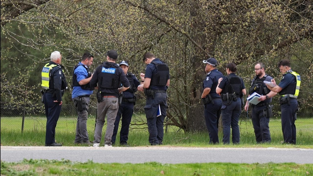 Search for fugitive over 'cold-blooded murder' of cops