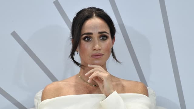 Three weeks away from children left Meghan 'not well'