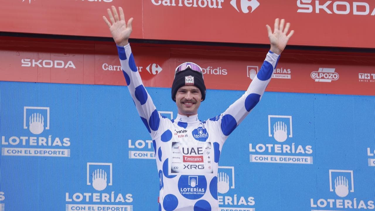 Vine still king of Vuelta mountains as teammate roars