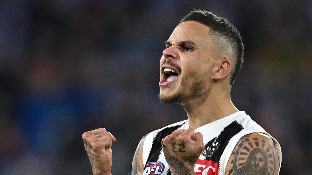 Collingwood premiership duo a chance to return: coach