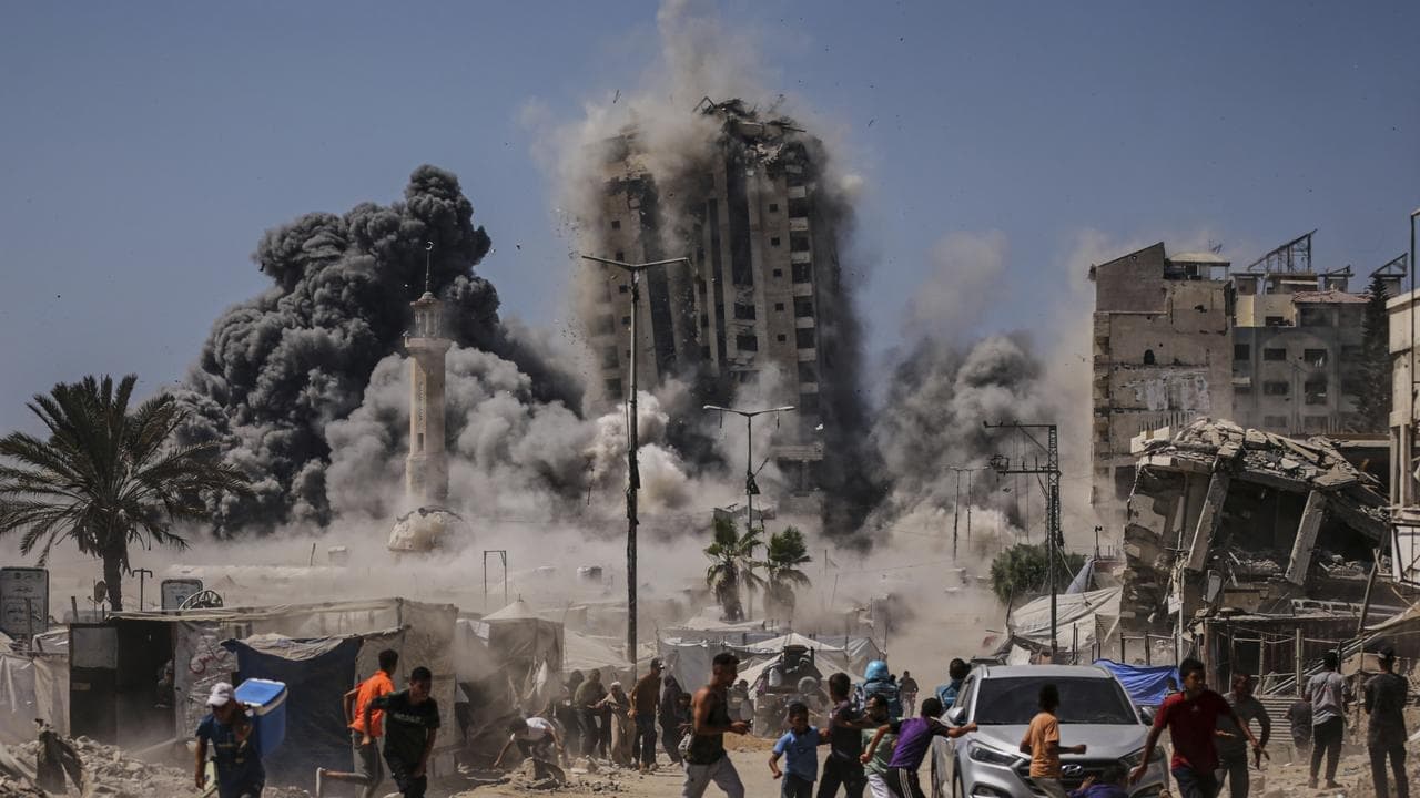 Hamas releases hostage video, Israel bombs high-rise