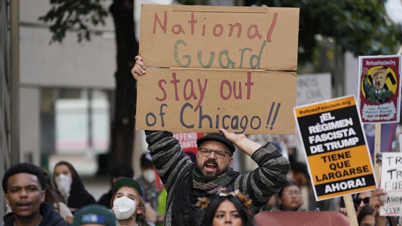 Trump threatens to deport defiant Chicago protesters