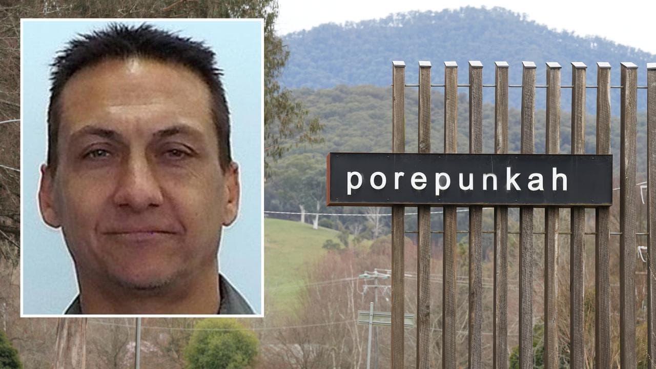 Community fractures as hunt for accused killer drags on